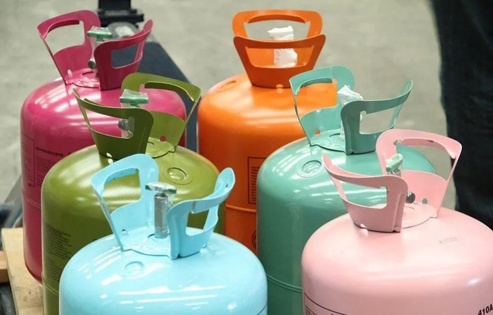 Colorful gas cylinders arranged in a group.